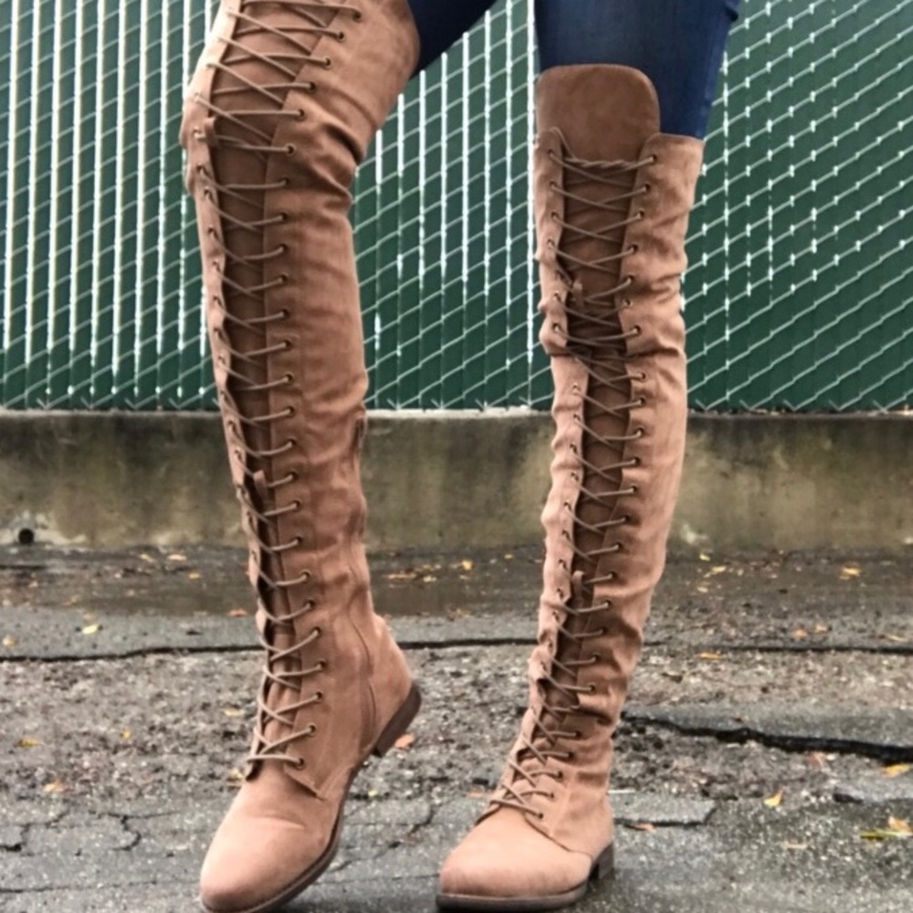 Above the knee lace up boots